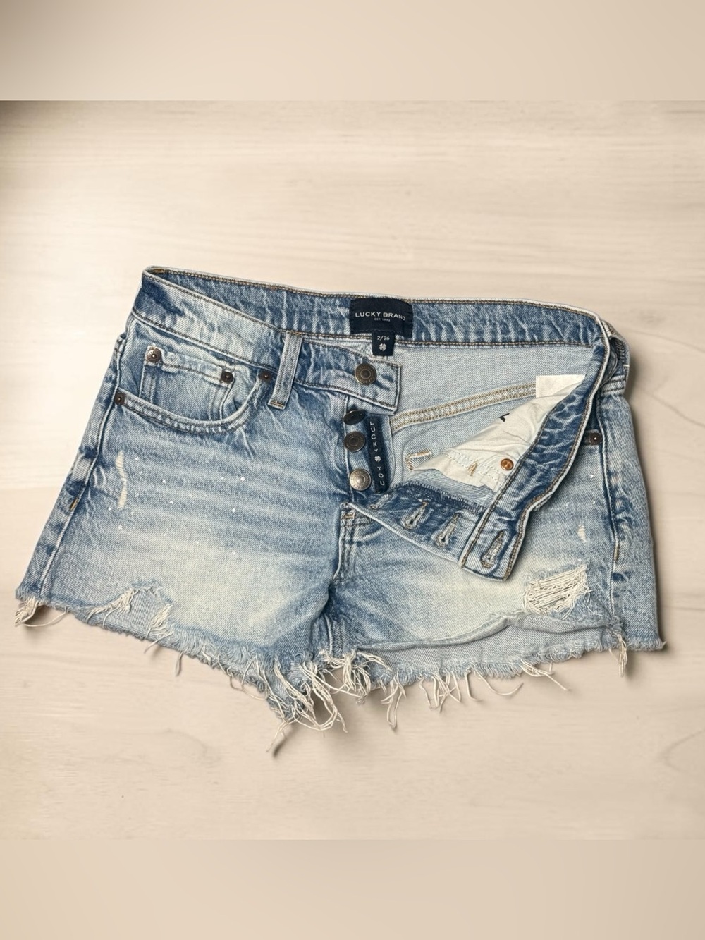 Lucky Brand Boyfriend Mid Rise Denim Shorts Women’s Size 2/26 Distressed Raw Hem